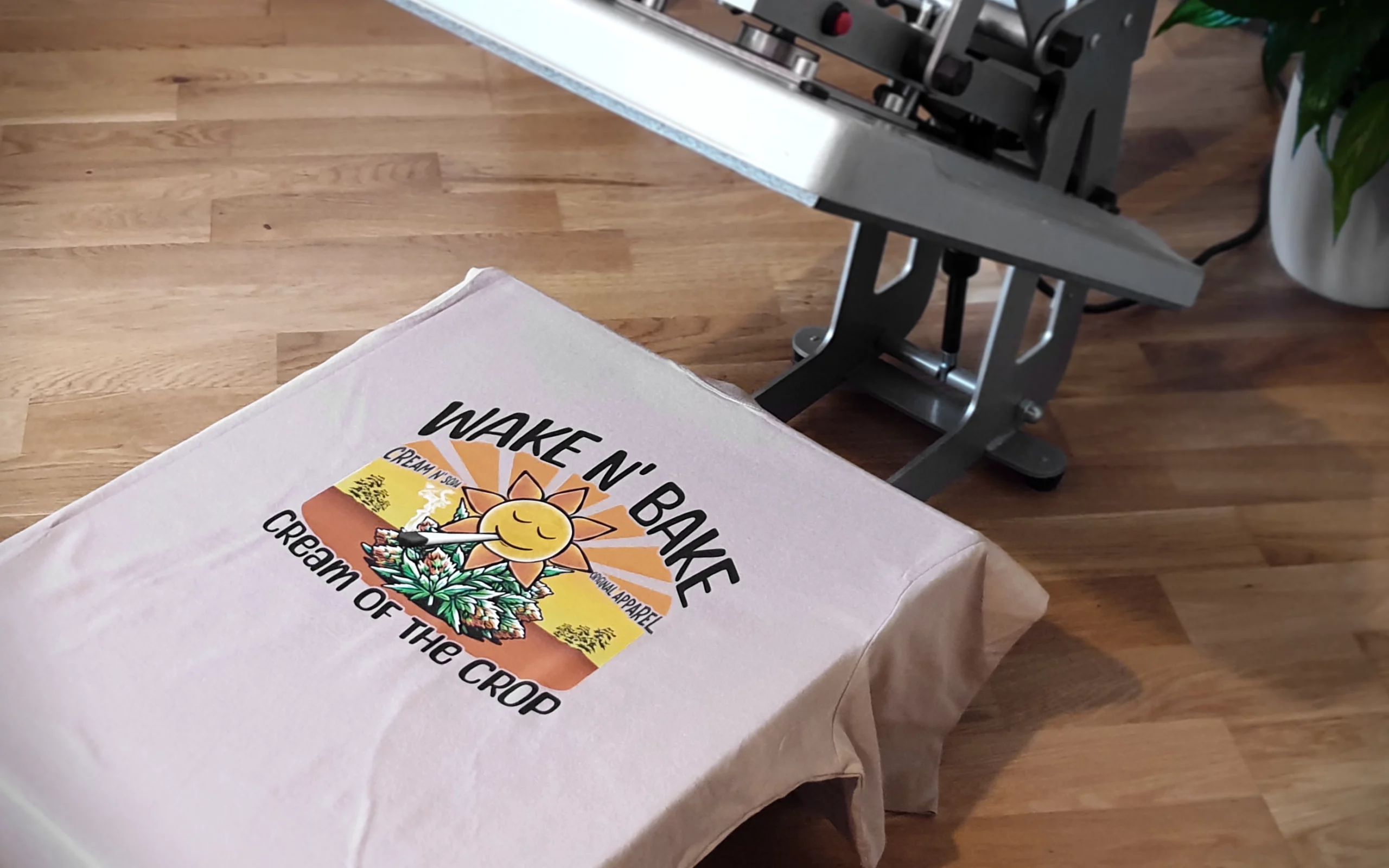 Cream Of The Crop Collective Wake N' Bake T-Shirt on heat press